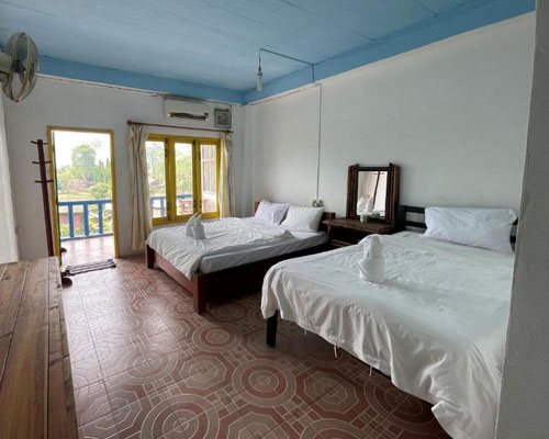 Clean, comfortable room at Blue Sunset Guesthouse